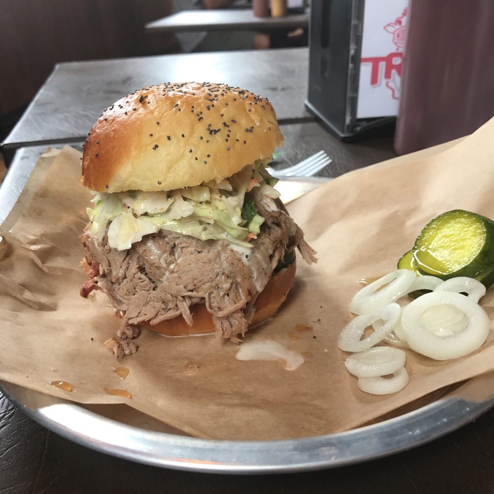 Triplets BBQ - OG Southern Slaw Burger 1/2 lb traditional hickory smoked pulled pork, creamy coleslaw, Carolina vinegar sauce. Yum! - Barbeque Near Me - Cadiz, Kentucky Triplets BBQ - OG Southern Slaw Burger 1/2 lb traditional hickory smoked pulled pork, creamy coleslaw, Carolina vinegar sauce. Yum! - Barbeque Near Me - Cadiz, Kentucky
