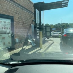 a car parked in front of a coffee shop