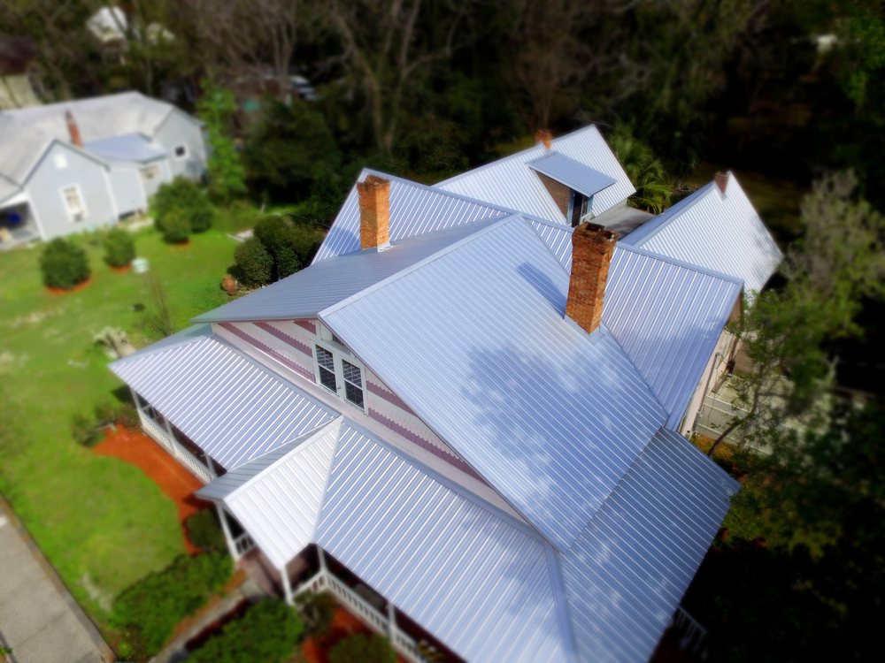 Slide of TMT Roofing