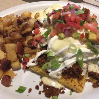 Wild Eggs - The Calamity Katie's eggs Benedict is delicious! - Breakfast & Brunch Near Me - Louisville, Kentucky Wild Eggs - The Calamity Katie's eggs Benedict is delicious! - Breakfast & Brunch Near Me - Louisville, Kentucky