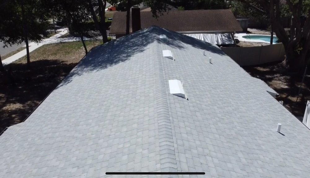 Slide of Tip Top Roofing