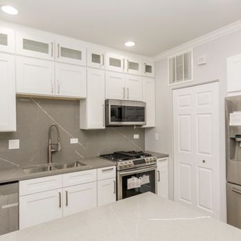 ProPoint Construction - a kitchen with stainless steel appliances - General Contractors Near Me ProPoint Construction - a kitchen with stainless steel appliances - General Contractors Near Me