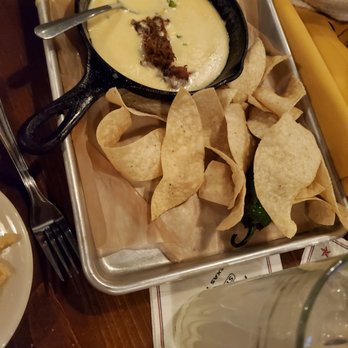 Saltgrass Steak House - White queso with Brisket and chips - Steakhouses Near Me - Westminster, Colorado Saltgrass Steak House - White queso with Brisket and chips - Steakhouses Near Me - Westminster, Colorado