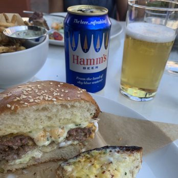 Grey Ghost - Burger cut in half, Hamms and fries. - American Near Me - Detroit, Michigan Grey Ghost - Burger cut in half, Hamms and fries. - American Near Me - Detroit, Michigan