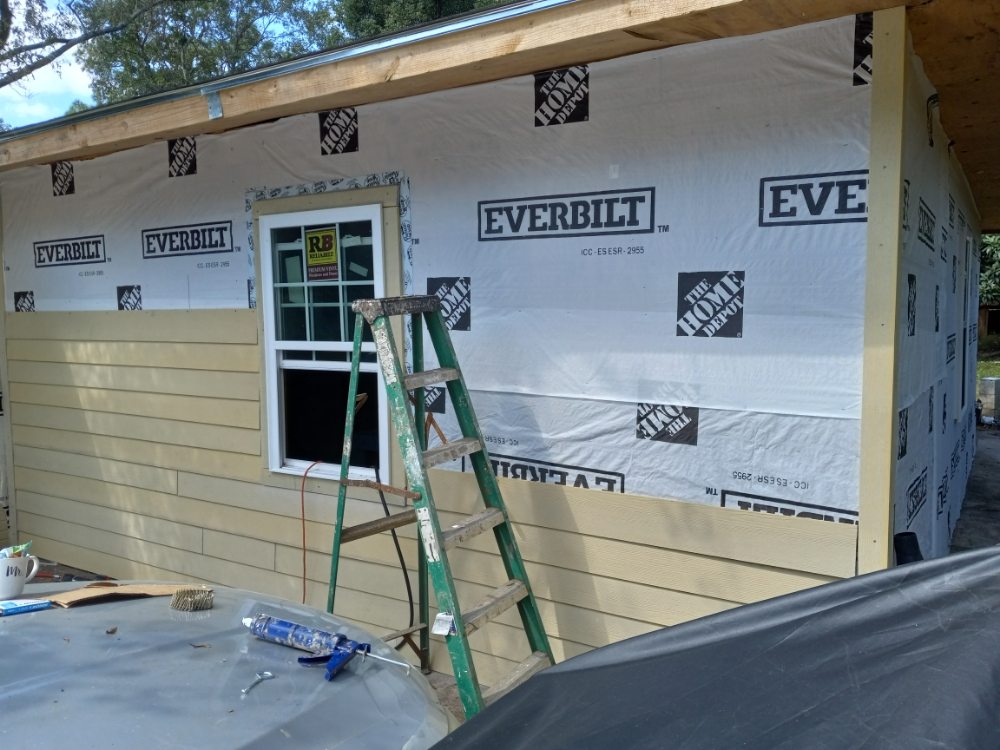 Slide of DJ'S Construction Roofing Siding & Framing