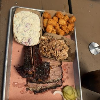 Blue Oak BBQ - Three Meat Plate with Brisket, Ribs, and Pulled Pork. Feat. Potato Salad and Beef Tallow Tots for the sides. - Barbeque Near Me - New Orleans, Louisiana Blue Oak BBQ - Three Meat Plate with Brisket, Ribs, and Pulled Pork. Feat. Potato Salad and Beef Tallow Tots for the sides. - Barbeque Near Me - New Orleans, Louisiana