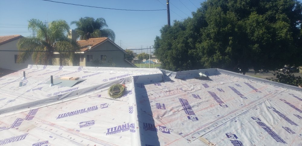 Slide of J 1 Pro Roofing