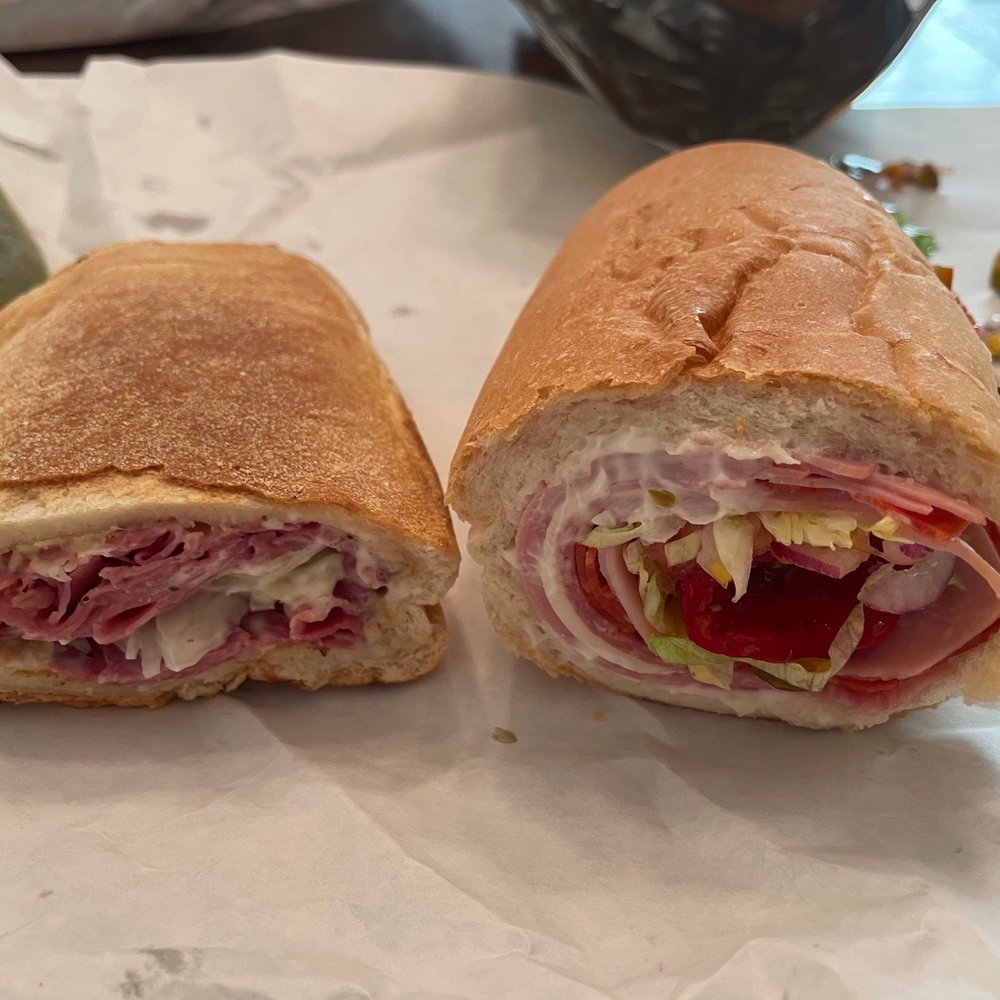 Toasted New Yorker Sub on left and The Mad Italian on the right. Toasted New Yorker Sub on left and The Mad Italian on the right.