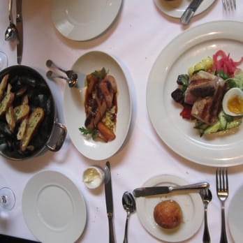 Spruce - mussels on left, boudin blanc with sauerkraut in center, yellow tail salad on right - American Near Me - San Francisco, California Spruce - mussels on left, boudin blanc with sauerkraut in center, yellow tail salad on right - American Near Me - San Francisco, California