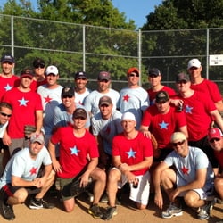 Kirkwood Trading Company - Custom league shirts with the same logo. Different color t-shirt and ink combinations on a softball league.