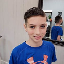 Cornerstone Barbershop - This young man went from handsome to handmost.