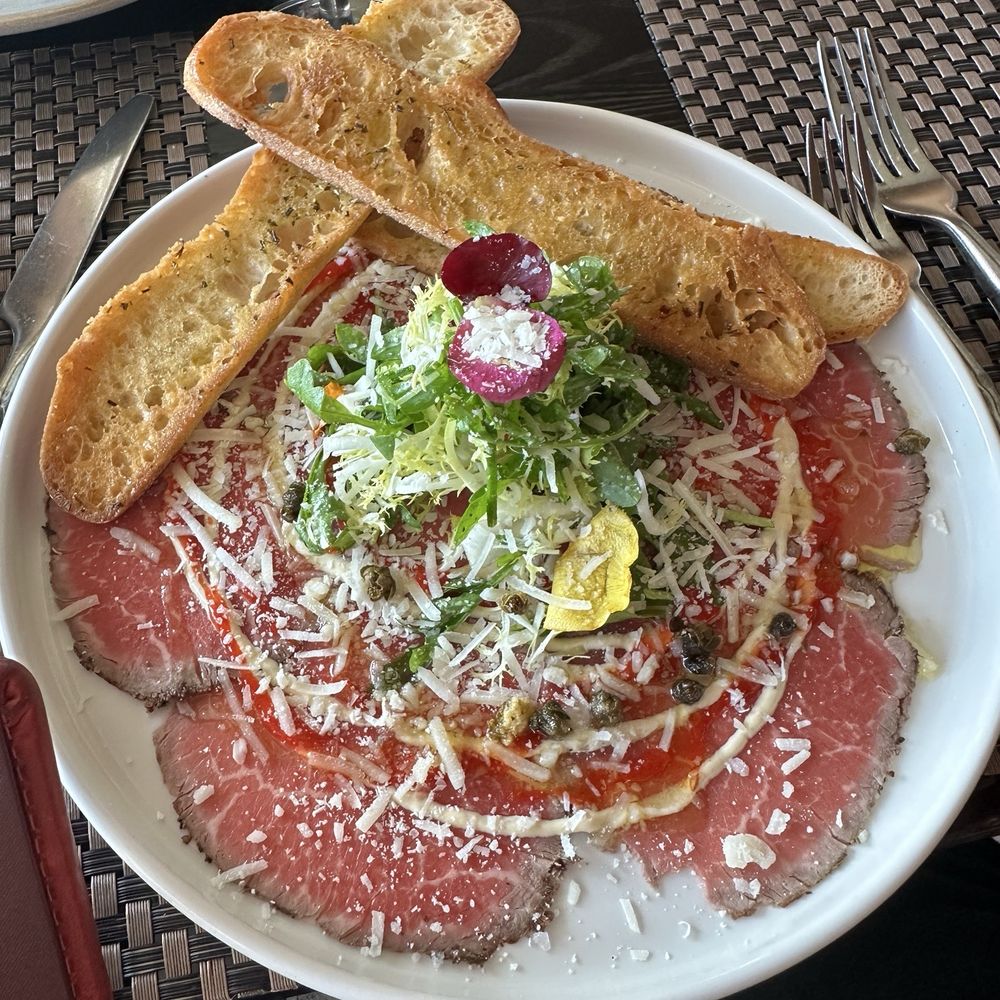 Six Seven Restaurant - Carpaccio - New American Near Me - Seattle, Washington Six Seven Restaurant - Carpaccio - New American Near Me - Seattle, Washington