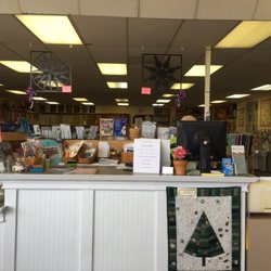 Ohio Star Quilts - A very friendly person is hiding behind the check out.