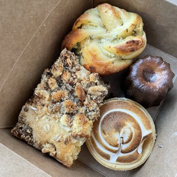 Four Letter Word - Canele, calamansi meringue tart, goat cheese knot, milo coffee cake slice .... so good!!! - Coffee & Tea Near Me - Chicago, Illinois