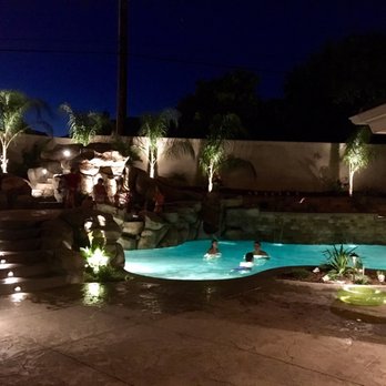 Bluewater Pools & Spas - a pool at night - General Contractors Near Me - Upland, California Bluewater Pools & Spas - a pool at night - General Contractors Near Me - Upland, California