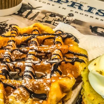 Sweet Tea & Coffee Cafe - Here's looking at you waffles draped in chocolate and caramel sauce ! - Coffee & Tea Near Me - Surprise, Arizona Sweet Tea & Coffee Cafe - Here's looking at you waffles draped in chocolate and caramel sauce ! - Coffee & Tea Near Me - Surprise, Arizona