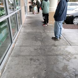 Dollar Tree - People waiting for store to open doors past the time they should already be open
