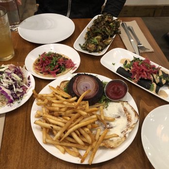 Seabirds Kitchen - Avocado taco, mushroom taco, Brussels sprouts, purple potato taquitos and veggie burger and fries. - Vegan Near Me - Costa Mesa, California