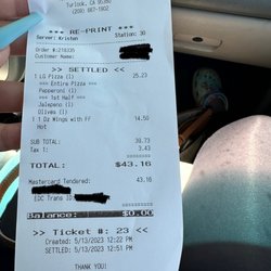 Jura's Pizza Parlor - Our server. Blacked out my significant other's personal information.