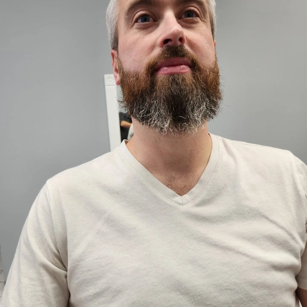 EJ's Barbershop Logo