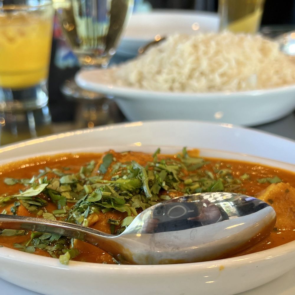 Wok India Restaurant and Bar - a bowl of curry with a spoon - Indian Near Me - Mason, Ohio