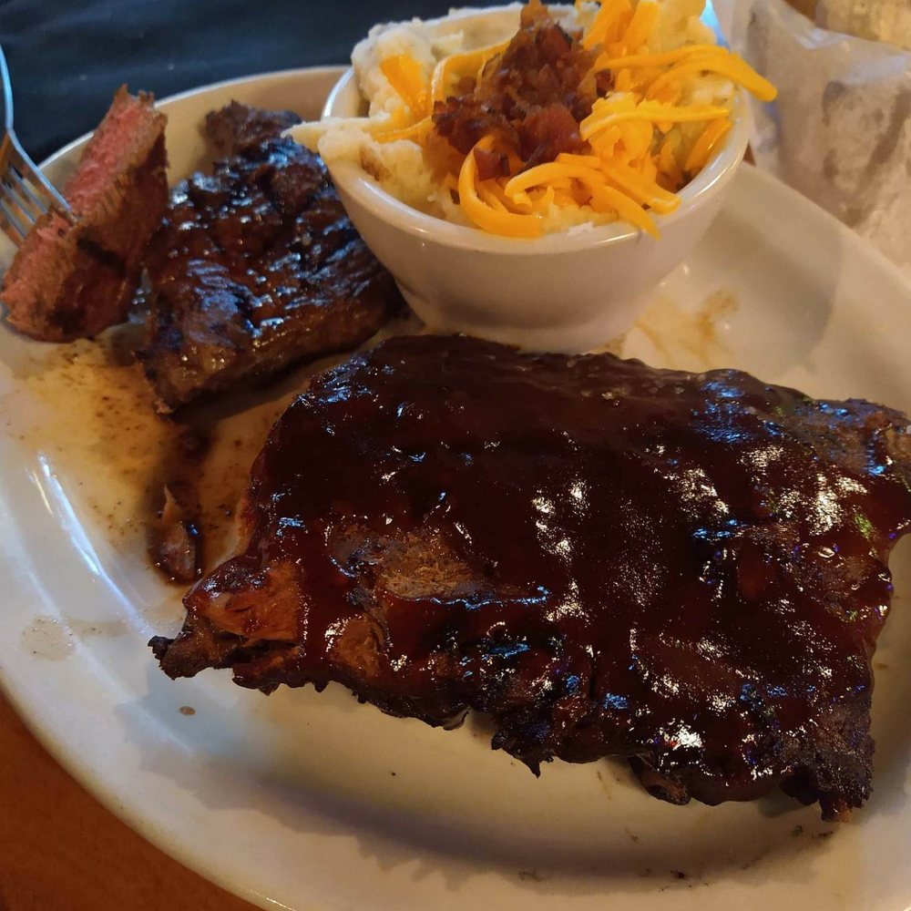 Texas Roadhouse - Steak and ribs combo with loaded mashed potatoes - Steakhouses Near Me - Longview, Texas Texas Roadhouse - Steak and ribs combo with loaded mashed potatoes - Steakhouses Near Me - Longview, Texas