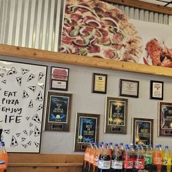Eagle One Pizza - Wall of awards