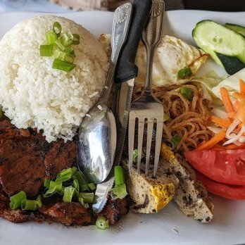 Nam Phuong - Rice platter with BBQ pork, shredded pork, egg quiche, over easy egg, tomatoes, do chua (pickled daikon/carrots), cucumber - Vietnamese Near Me - Atlanta, Georgia Nam Phuong - Rice platter with BBQ pork, shredded pork, egg quiche, over easy egg, tomatoes, do chua (pickled daikon/carrots), cucumber - Vietnamese Near Me - Atlanta, Georgia