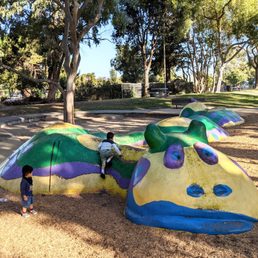 Large concrete snake/caterpillar kids love climbing on Large concrete snake/caterpillar kids love climbing on