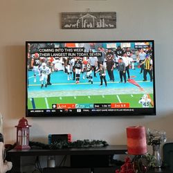 Hi-Tech Installations - Tv Mounted with wires hidden in wall.