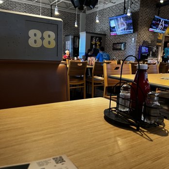 Buffalo Wild Wings - the inside of a restaurant - Chicken Wings Near Me - College Station, Texas