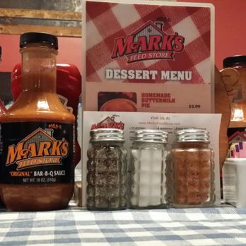 Mark's Feed Store - Condiments on each table along with a roll of paper towels - Barbeque Near Me - Louisville, Kentucky