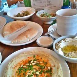 Paviljoen van Beuningen - Full shakshuka (comes with pita bread, hummus, tahina, labneh & an Israeli salad). Btw, the olives were hella pukka!
