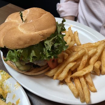 MJ's Restaurant Bar & Grill - My friend's burger was huge, cooked perfectly and (he said) DELICIOUS!!! - American Near Me - Middletown, New Jersey MJ's Restaurant Bar & Grill - My friend's burger was huge, cooked perfectly and (he said) DELICIOUS!!! - American Near Me - Middletown, New Jersey