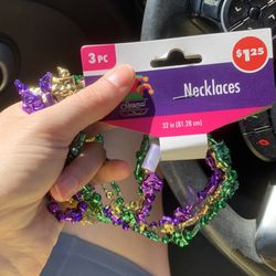 Pack of three Mardi Gras beads for $1.25