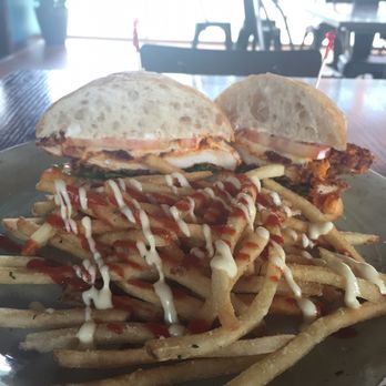Table 9 - Buffalo Chicken Sandwich with sriracha and garlic aioli fries - New American Near Me - Morgantown, West Virginia Table 9 - Buffalo Chicken Sandwich with sriracha and garlic aioli fries - New American Near Me - Morgantown, West Virginia