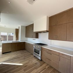 Santa Fe Kitchen Design - Large kitchen with an efficient layout and plenty of storage and countertop space for a personal chef.