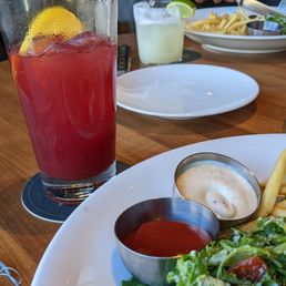 Sangria and side view of steak frites Sangria and side view of steak frites