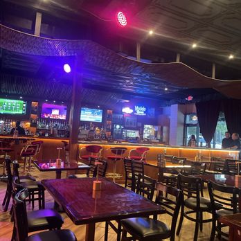 Monarch Bar and Lounge - Seating area and bar. - Bars Near Me - Houston, Texas Monarch Bar and Lounge - Seating area and bar. - Bars Near Me - Houston, Texas