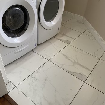 Dolphin Carpet - Tile in two bathrooms and laundry room. - Carpeting Near Me - Davie, Florida