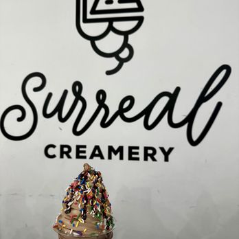 Surreal Creamery - Small cup with chocolate soft serve, chocolate sauce, and rainbow sprinkles - Ice Cream & Frozen Yogurt Near Me - Philadelphia, Pennsylvania