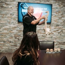 Barham Chiropractic - Dr. Barham during a patient presentation at our Sacramento Chiropractic Office