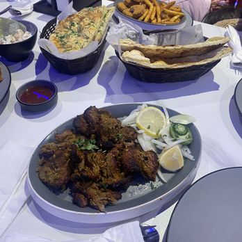 Shalimar Restaurant - Garlic naan, chicken nuggets with French fries, and bihari kabob - Indian Near Me - Iselin, New Jersey