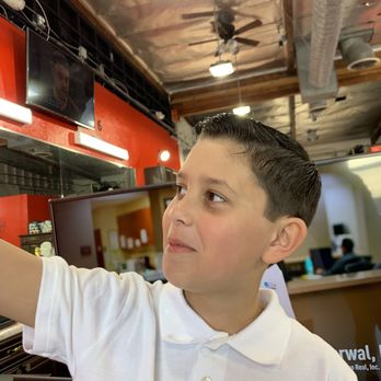 4 Aces Barber Shop - My son looked like a rag a muffin before we came in here. Kim did a great job! Quick haircut. $10. Will come here again! - Barbers Near Me - Orange, California