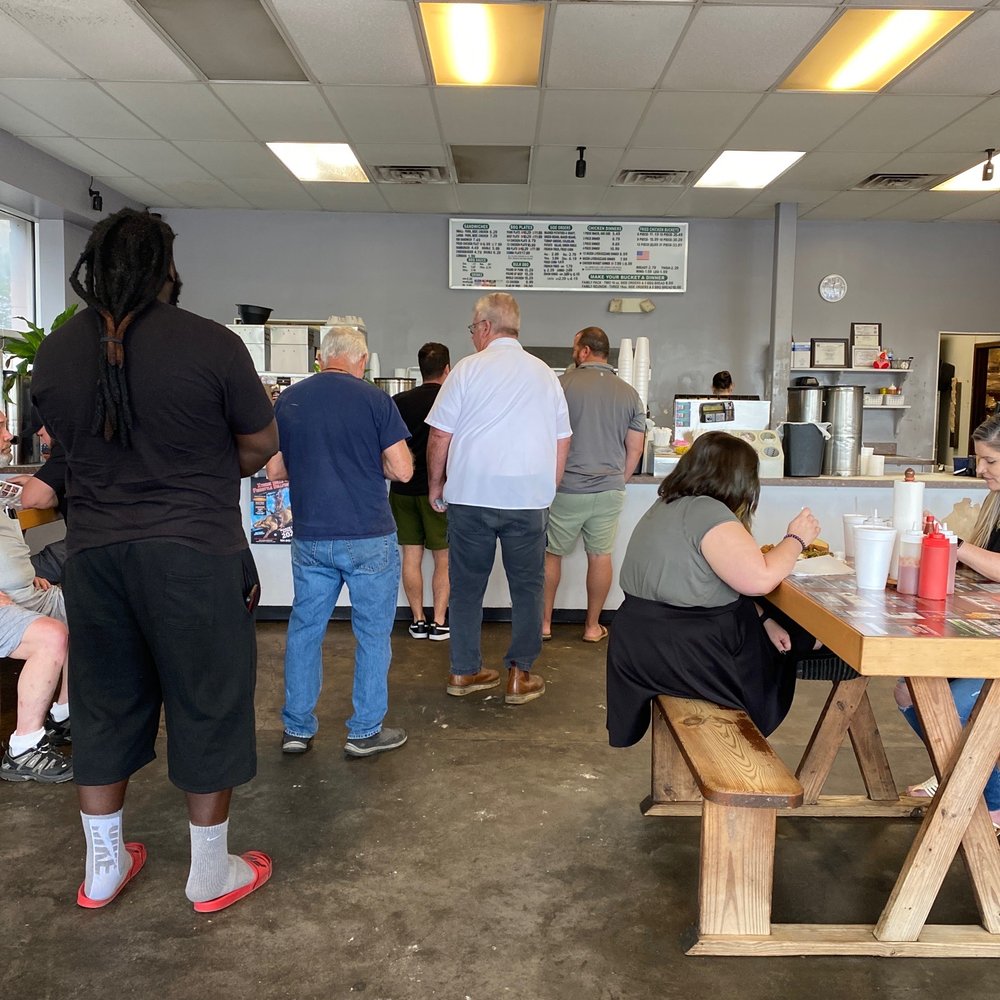 Callahan Barbecue - a group of people eating at a table - Barbeque Near Me - Callahan, Florida