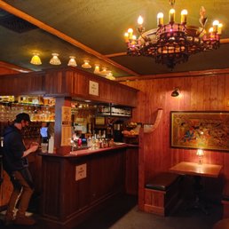 a man standing at the bar