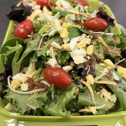 PLNTD Juice - Cobb Salad - Mixed Greens, Grape Tomatoes, Shredded Cheese, Chopped Egg, and Bacon Crumbles paired with your favorite dressing.