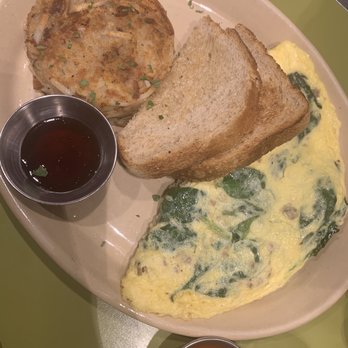 Snooze, an A.M. Eatery - 3 egg omelette with cheese, spinach and sausage- with a hash brown and sourdough (and strawberry preserve) - Breakfast & Brunch Near Me - Katy, Texas Snooze, an A.M. Eatery - 3 egg omelette with cheese, spinach and sausage- with a hash brown and sourdough (and strawberry preserve) - Breakfast & Brunch Near Me - Katy, Texas