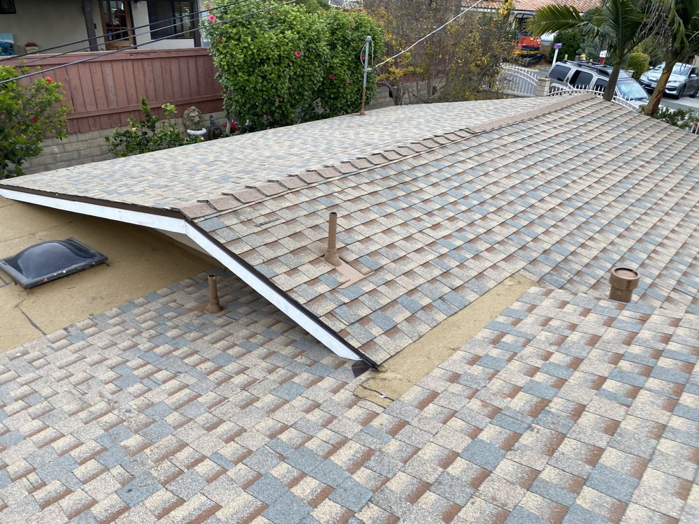 Slide of Delino’s Roofing & Remodeling