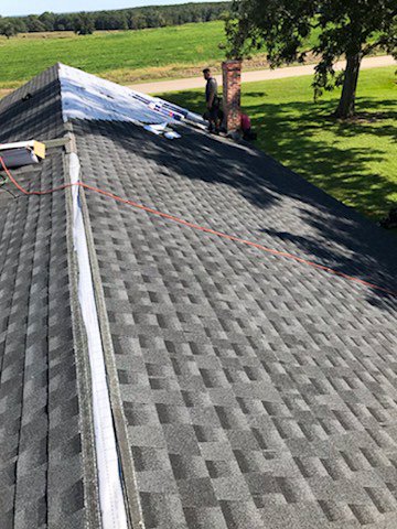 Slide of Rock Creek Roofing